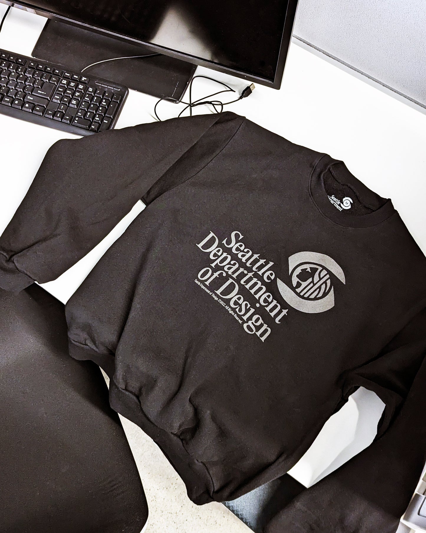 D.9 Staff Crewneck
